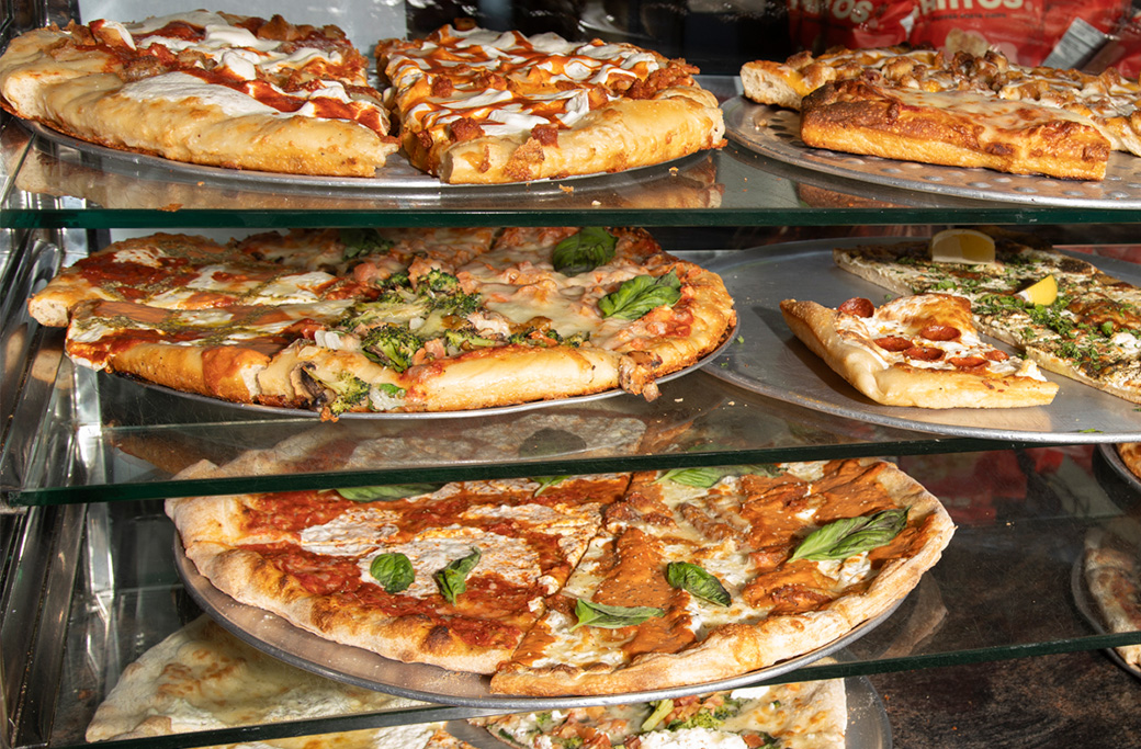 How Should You Adjust Your Pizza Order Based on the Guest Count?