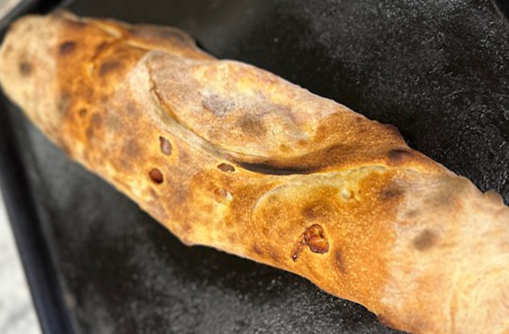Pepperoni stromboli with melted mozzarella baked fresh at Fusaro’s Pizza & Pasta