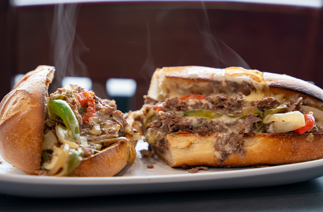 Fusaro’s cheesesteak topped with steak, melted cheese, peppers, onions and mushrooms