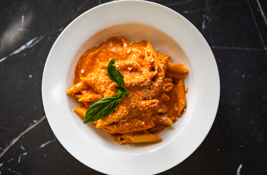 Pasta coated in creamy tomato vodka sauce